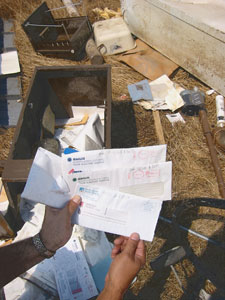 A person holding a piece of paperDescription automatically generated with low confidence